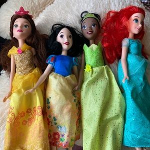 Belle, Snow White, Tiana, and Ariel princess
